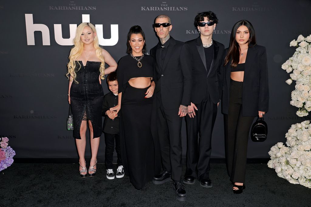 Alabama Barker, Reign Disick, Kourtney Kardashian, Travis Barker, Landon Barker and Atiana De La Hoya attend the Los Angeles premiere of Hulu's new show "The Kardashians" at Goya Studios on April 07, 2022 in Los Angeles, California