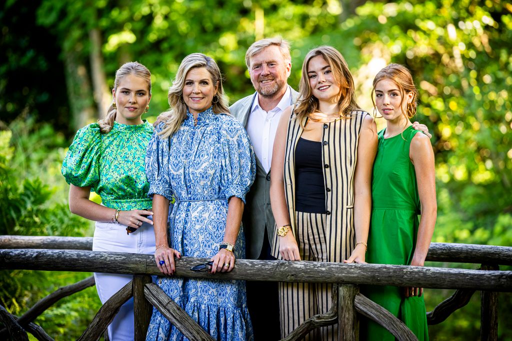 dutch royal family posing for portraits outside 