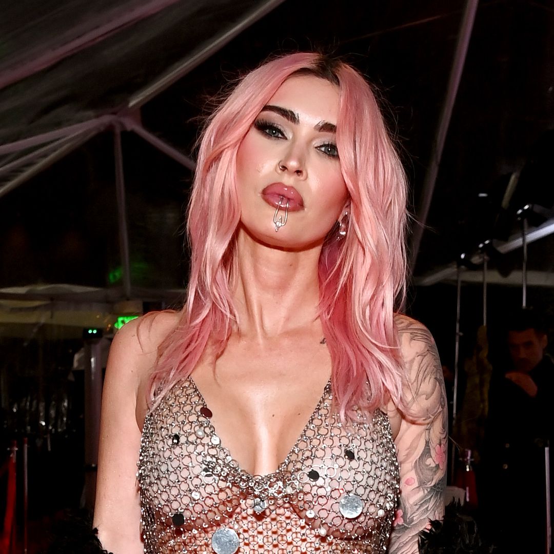 Megan Fox unveils giant new body tattoo in completely see-through dress