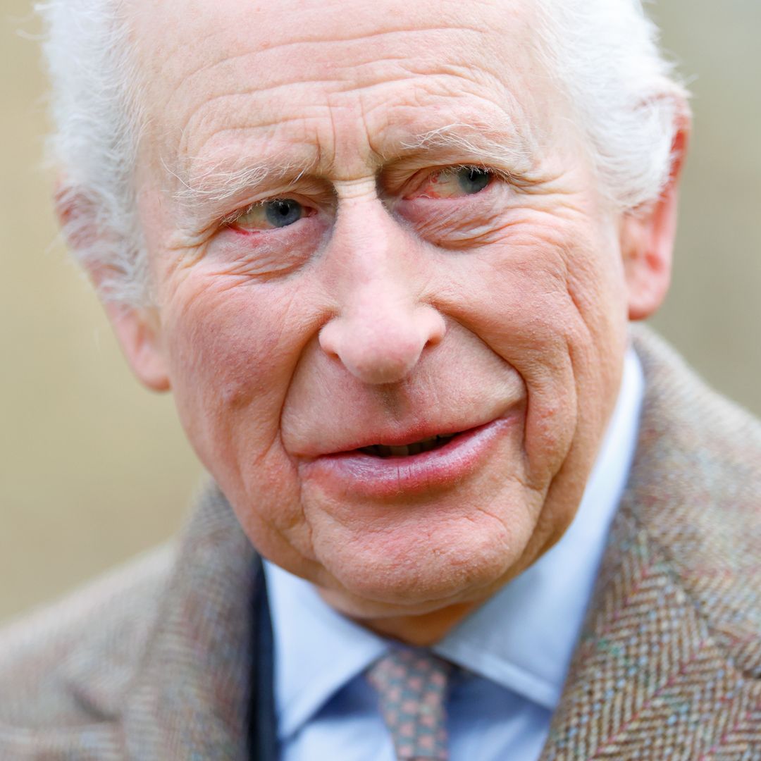 King Charles pictured with walking stick in new photos at home